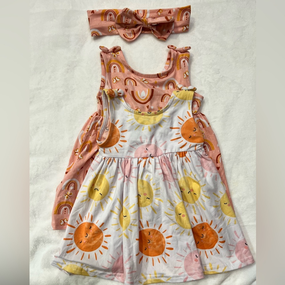 Set of 2 dresses with a matching headband